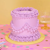 Vintage Cake - Single Colour in lavender with Swiss Meringue icing, 6 layers, hand-decorated by Crumbs & Doilies.